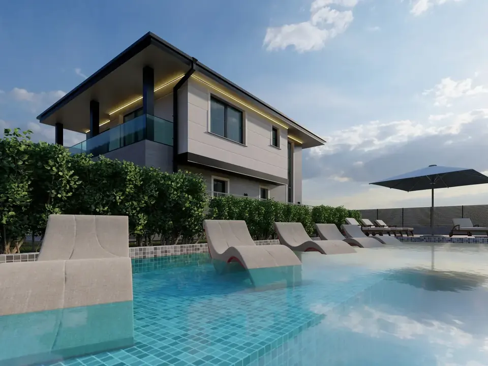 Villa der Prime Residenz mit privatem Pool und Liegen im Wasser